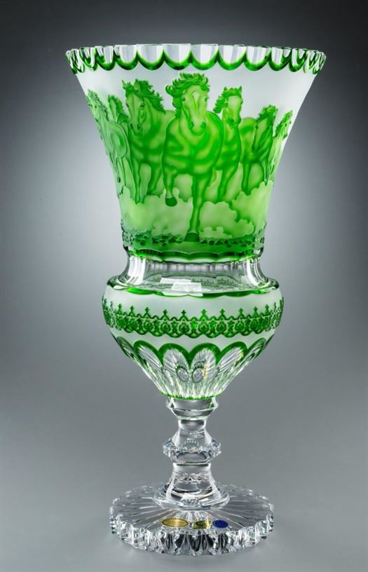 Green ornate crystal vase with hunting scene engravings